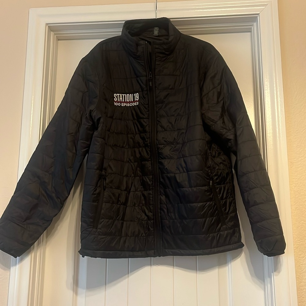 Men’s black windbreaker from show “Station 19.” Size XL